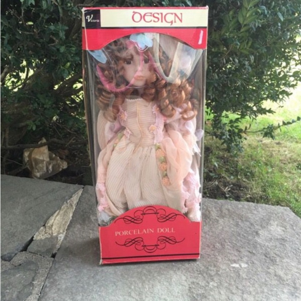 Porcelain Beautiful Doll New in the Box all dressed in Pink Hand Painted